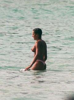 Melanie Brown topless in a ocean paparazzi image