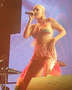 Tove Lo tit slip on a stage