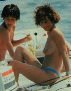 Corinne Clery topless on a boat paparazzi photo