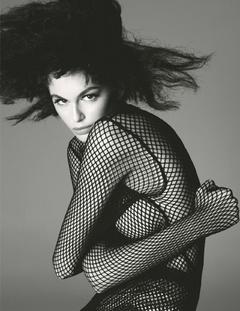 Kaia Gerber in fishnet dress for British Vogue, October 2019