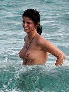 Shermine Shahrivar topless in a water paparazzi photo
