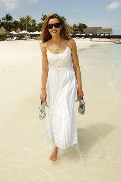 Natascha McElhone in white dress