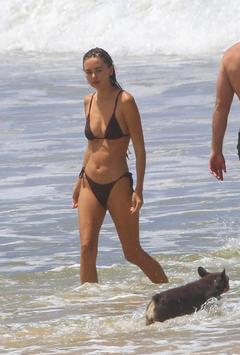 Gabriella Brooks enjoys the beach with her dogs in Byron Bay