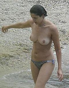 Blanca Romero caught topless on a beach