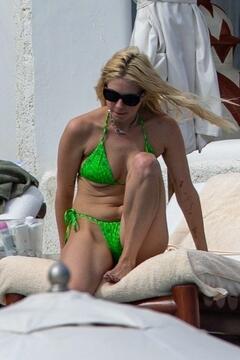 Ashley Benson in green bikini bikini out in Los Cabos, Mexico - February 2023