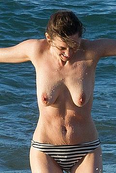 French actress Marion Cotillard nude breasts on beach in Fuereventura
