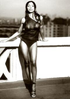 Toni Braxton braless in sheer top