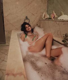 Kendall Jenner in a bathtub for Vogue Magazine Italia