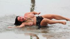 Lisa Appleton topless on a beach paparazzi photo