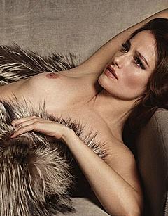 Marie Gillain lying topless