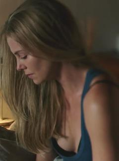 Charlize Theron downblouse in