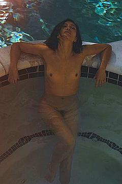 Nicole Branch fully nude in a pool photo