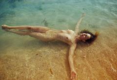 Julija Steponaviciute fully nude in a water