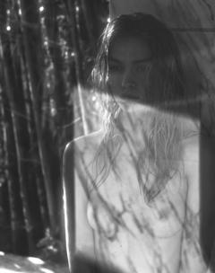 Stella Maxwell topless black-&-white image