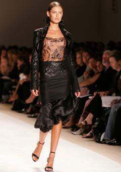 Bianca Balti in see through top runway photo