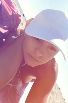 Alexandra Stan enjoys a sunny day on the beach