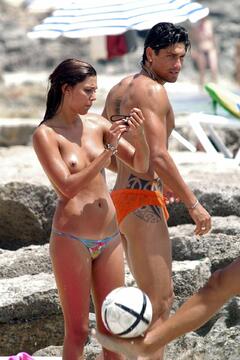 Belen Rodriguez topless candids at the beach in Formentera
