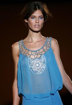 Bianca Klamt walks runway braless in see through dress
