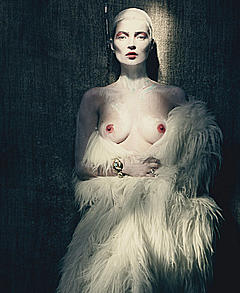 Supermodel Kate Moss topless