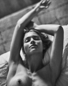 Elyse Taylor topless black-&-white photo