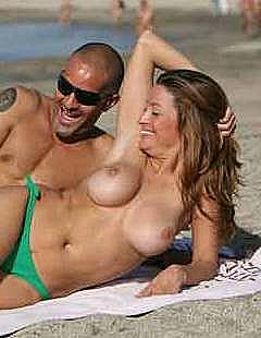 Rebecca Loos sunbathing topless