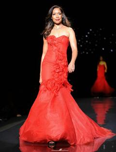 Gina Torres walks runway at Go Red For Women The Heart Truth Red Dress Fashion Show in NY