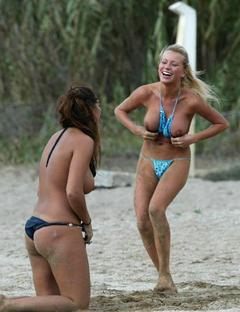 Natalie Denning nude tits on a beach with friends