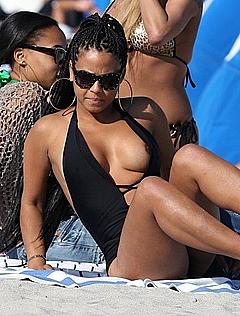 Christina Milian nip slip in black swimsuit
