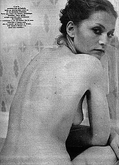 Isabelle Huppert sitting naked