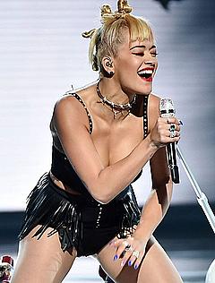Rita Ora sexy performs on a stage
