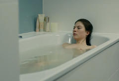 Nora Von Waldstaetten nude in a bathtub at Oktober November