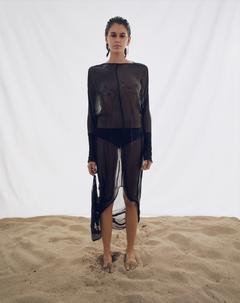 Kaia Gerber braless in see through dress