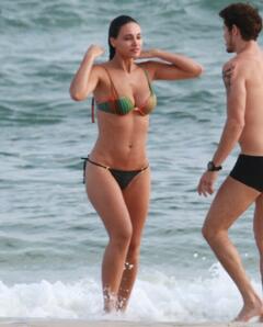 Debora Nascimento in bikini on the beach of Barra da Tijuca in Rio de Janeiro