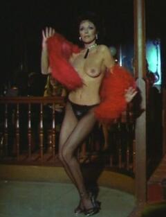 Joan Collins topless at Poliziotto senza paura