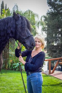 Erika Eleniak - 2018 photoshoot with a horse