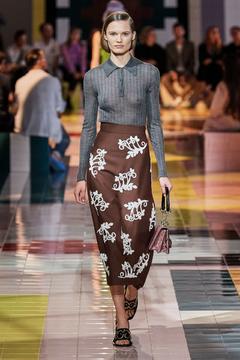 Elsemarie Riis braless in see through blouse walking the runway for Prada Spring 2020