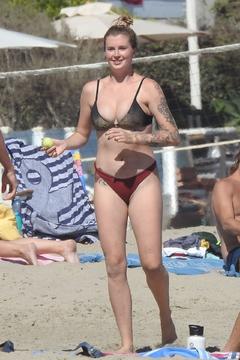 Ireland Baldwin in bikini on the beach in Malibu