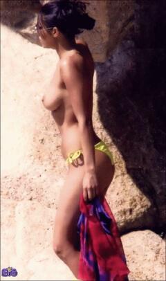 Carolina Marconi topless on a beach paparazzi photo