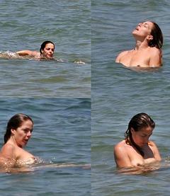 Claudia Gerini topless in a water paparazzi collage