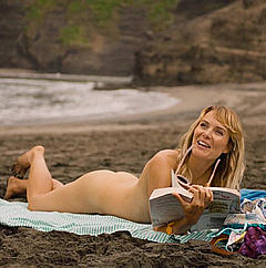 Emma Leonard tanning naked in 800 Words
