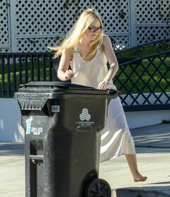 Dakota Fanning braless gets her trash can in Los Angeles - October 2025