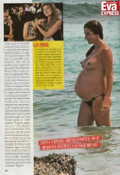Pregnant Nina Palmieri topless on a beach paparazzi photo
