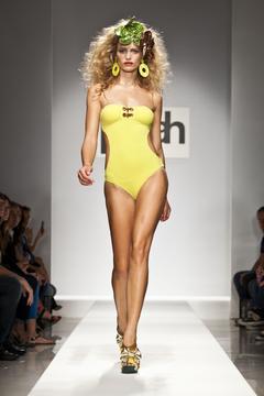 Flavia Lucini in yellow bodysuit runway image