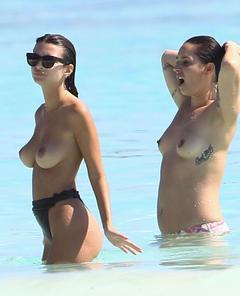 Emily Ratajkowski topless with friends on a beach in Cancun