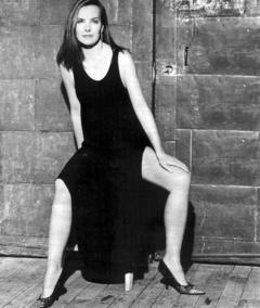 Carole Bouquet in black dress