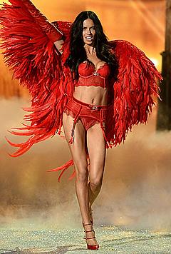 Adriana Lima in red lingerie runway image