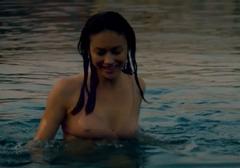 Olga Kurylenko in wet see through bra at The Bay Of Silence