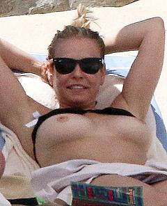 Chelsea Handler sunbathing topless
