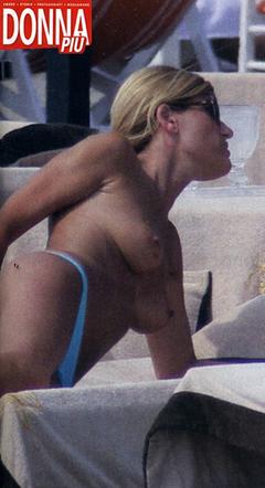 Raffaella Zardo topless on a beach paparazzi image