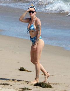 Ireland Baldwin in a bikini at a beach in Malibu